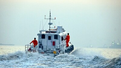 Rescue work underway after a ferry capsized off Mumbai coast when a Navy craft crashed into it. (PTI) Rescue work underway after a ferry capsized off Mumbai coast when a Navy craft crashed into it. (PTI)