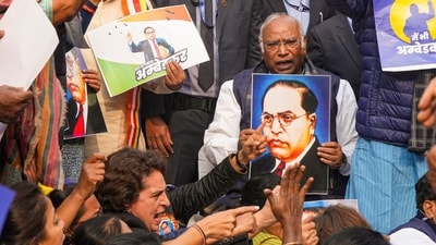 LoP in the Rajya Sabha and Congress MP Mallikarjun Kharge with party MP Priyanka Gandhi Vadra and other INDIA bloc members during a protest in Parliament premises. (PTI) LoP in the Rajya Sabha and Congress MP Mallikarjun Kharge with party MP Priyanka Gandhi Vadra and other INDIA bloc members during a protest in Parliament premises. (PTI)