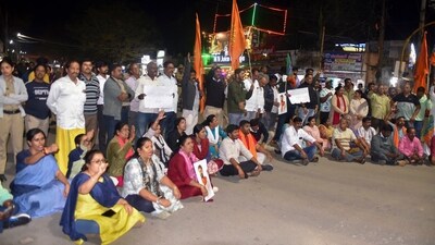 BJP supporters during a protest over the arrest of Karnataka MLC CT Ravi over his alleged remarks on minister Laxmi Hebbalkar (PTI) BJP supporters during a protest over the arrest of Karnataka MLC CT Ravi over his alleged remarks on minister Laxmi Hebbalkar (PTI)