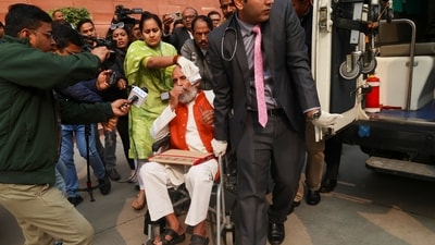 New Delhi: BJP MP Pratap Chandra Sarangi on a wheelchair being taken to a hospital after he got injured in clashes between INDIA Bloc and NDA MPs during a protest, at Parliament conplex, in New Delhi. (PTI)
