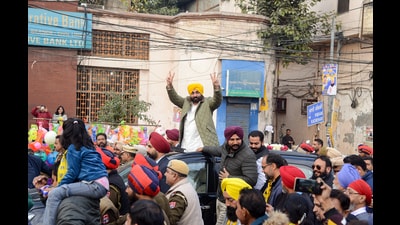 Punjab chief minister Bhagwant Mann during a roadshow in Jalandhar. (ANI)