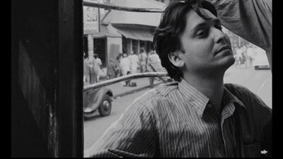 Soumitra Chatterjee on a tram in Apur Sansar (1959). (Film still) Soumitra Chatterjee on a tram in Apur Sansar (1959). (Film still)