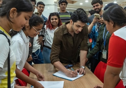 Vedang giving autograph to school kids (Photo: Satish Bate) Vedang giving autograph to school kids (Photo: Satish Bate)