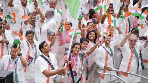 The Indian contingent in Tarun Tahiliani designed ensembles at the opening ceremony of the Paris Olympics. (PTI) The Indian contingent in Tarun Tahiliani designed ensembles at the opening ceremony of the Paris Olympics. (PTI)