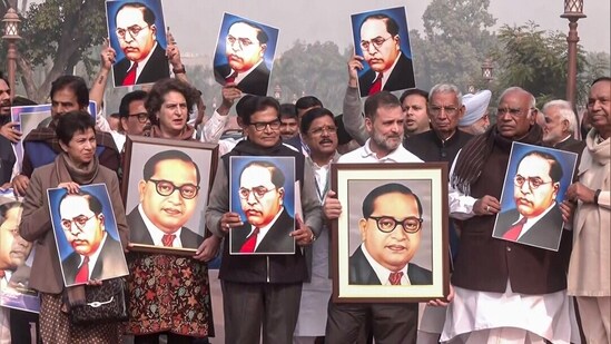 Leader of Opposition in Rajya Sabha Mallikarjun Kharge, Leader of Opposition in Lok Sabha Rahul Gandhi, Congress MPs Priyanka Gandhi Vadra, Selja Kumari, Samajwadi Party (SP) MP Ram Gopal Yadav and Opposition MPs hold portraits of BR Ambedkar during their protest against Amit Shah's remarks in New Delhi on December 18. (ANI)