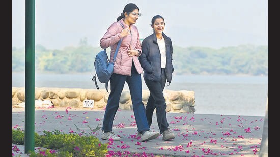 Visitors at Sukhna Lake in Chandigarh on Thursday. (Ravi Kumar/HT)