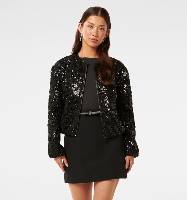 A well-fitted coverup looks good over a dress or corset. Use it to glam up a wedding outfit. (Forever New) A well-fitted coverup looks good over a dress or corset. Use it to glam up a wedding outfit. (Forever New)