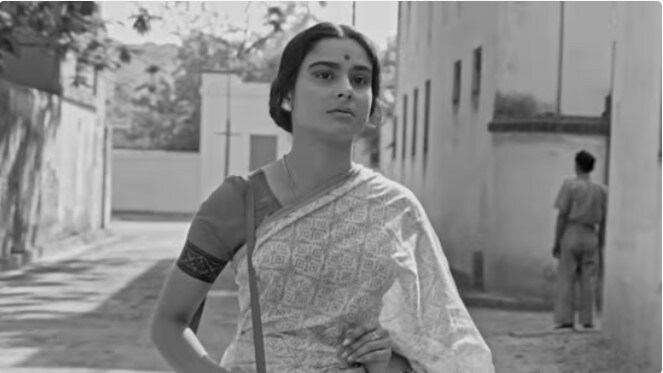 Madhabi Mukherjee in Mahanagar (1963). “As the background score sets the culminating note, viewers see a close up of the mast of an electric tram pass by as the couple disappears into the crowd. “ (Film still) Madhabi Mukherjee in Mahanagar (1963). “As the background score sets the culminating note, viewers see a close up of the mast of an electric tram pass by as the couple disappears into the crowd. “ (Film still)