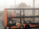 Charred remains of a truck at the site of the accident after a massive fire started due to a collision between a gas tanker and multiple vehicles near a petrol pump on the Jaipur-Ajmer Highway. Charred remains of a truck at the site of the accident after a massive fire started due to a collision between a gas tanker and multiple vehicles near a petrol pump on the Jaipur-Ajmer Highway.