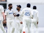 India's Virat Kohli (C) greets Jasprit Bumrah (2nd L) for his wicket of Australia's Usman Khawaja on day two of the third cricket Test India's Virat Kohli (C) greets Jasprit Bumrah (2nd L) for his wicket of Australia's Usman Khawaja on day two of the third cricket Test