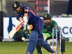 Virat Kohli plays a shot in a match between India and Pakistan. Virat Kohli plays a shot in a match between India and Pakistan.