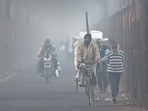 Commuters make their way through an old iron bridge on a smoggy winter morning in New Delhi on December 19, 2024. Commuters make their way through an old iron bridge on a smoggy winter morning in New Delhi on December 19, 2024.