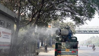 An anti-smog vehicle sprinkles water to mitigate pollution. (ANI photo) An anti-smog vehicle sprinkles water to mitigate pollution. (ANI photo)
