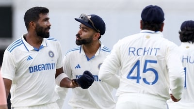 India's Virat Kohli (C) greets Jasprit Bumrah (2nd L) for his wicket of Australia's Usman Khawaja on day two of the third cricket Test (AFP) India's Virat Kohli (C) greets Jasprit Bumrah (2nd L) for his wicket of Australia's Usman Khawaja on day two of the third cricket Test (AFP)