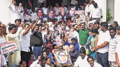 Congress supporters protest over Union Home Minister Amit Shah's speech in Rajya Sabha during the Constitution debate and Karnataka BJP leader CT Ravi's alleged remarks on state minister Laxmi Hebbalkar, at party office in Bengaluru on Friday. (ANI) Congress supporters protest over Union Home Minister Amit Shah's speech in Rajya Sabha during the Constitution debate and Karnataka BJP leader CT Ravi's alleged remarks on state minister Laxmi Hebbalkar, at party office in Bengaluru on Friday. (ANI)