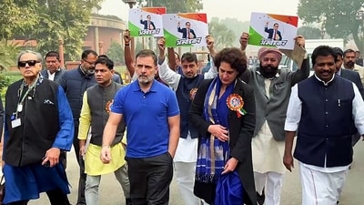 Lok Sabha LoP Rahul Gandhi with Congress MP Priyanka Gandhi Vadra and other India bloc MPs hold a protest march from Babasaheb Ambedkar statue at the Parliament premises to Makar Dwar in New Delhi on December 19. (ANI)