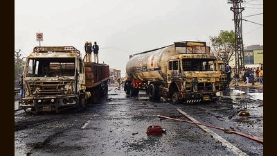 Firefighters extinguish the fire at the site of the accident on the Jaipur-Ajmer Highway on Friday. (ANI) Firefighters extinguish the fire at the site of the accident on the Jaipur-Ajmer Highway on Friday. (ANI)