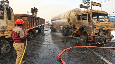 Firefighters douse the fire at the site of the accident after a truck loaded with a chemical collided with some other vehicles and caught fire on the Jaipur-Ajmer Highway. (PTI) Firefighters douse the fire at the site of the accident after a truck loaded with a chemical collided with some other vehicles and caught fire on the Jaipur-Ajmer Highway. (PTI)