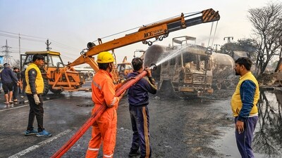 Eyewitnesses reported spotting the flames from nearly a kilometre away as ambulances and fire brigade vehicles rushed towards the crash zone. (PTI) Eyewitnesses reported spotting the flames from nearly a kilometre away as ambulances and fire brigade vehicles rushed towards the crash zone. (PTI)