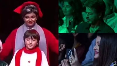 Shah Rukh Khan and Aishwarya Rai record their kids' performances at school event. Shah Rukh Khan and Aishwarya Rai record their kids' performances at school event.