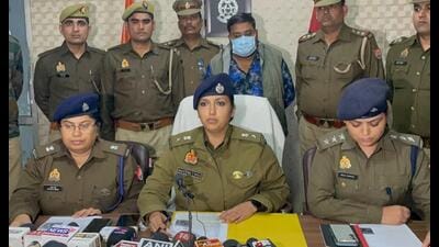 The accused in police custody. (Sourced)