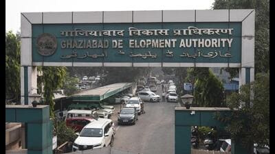 The main gates of the Ghaziabad Development Authority were shut at about 10.15am on Wednesday, and nearly 40 basic staff waited outside before they were allowed entry. They were allowed to enter only after a list of their names and departments was prepared. (Sakib Ali/HT PHOTO) The main gates of the Ghaziabad Development Authority were shut at about 10.15am on Wednesday, and nearly 40 basic staff waited outside before they were allowed entry. They were allowed to enter only after a list of their names and departments was prepared. (Sakib Ali/HT PHOTO)