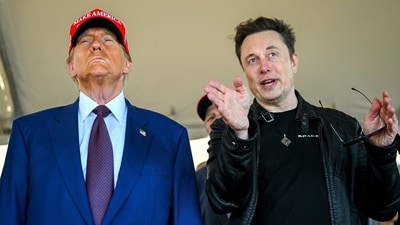 President-elect Donald Trump listens to Elon Musk as he arrives to watch SpaceX's mega rocket Starship lift off. (AP) President-elect Donald Trump listens to Elon Musk as he arrives to watch SpaceX's mega rocket Starship lift off. (AP)