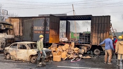 Firefighters at the site of the accident after a truck loaded with a chemical collided with some other vehicles and caught fire on the Jaipur-Ajmer Highway. (PTI) Firefighters at the site of the accident after a truck loaded with a chemical collided with some other vehicles and caught fire on the Jaipur-Ajmer Highway. (PTI)