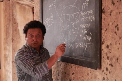 Shiboprosad Mukherjee in a still from the film, where he played the lead role of Bikram Pramanik.