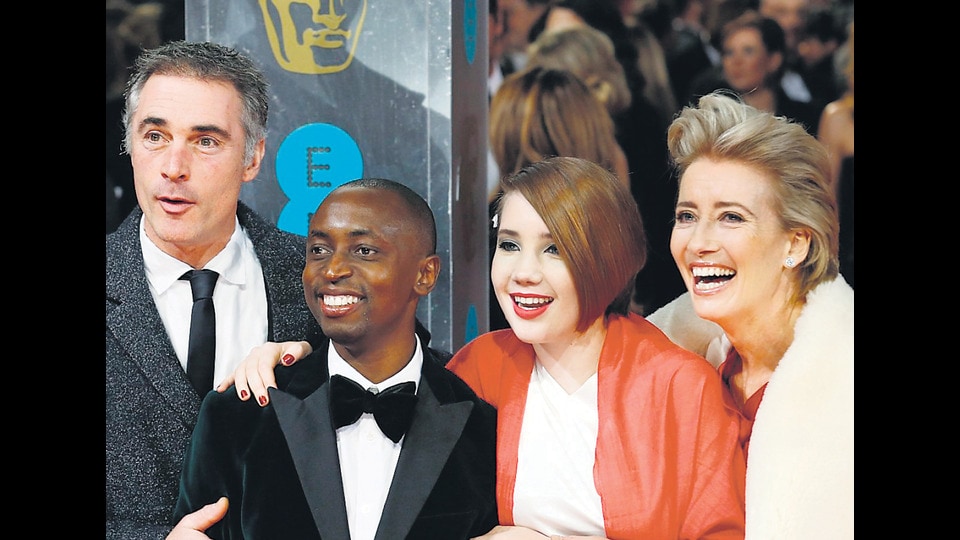Actors Emma Thompson and Greg Wise adopted Tindyebwa, a refugee from Rwanda. He now works with the police.