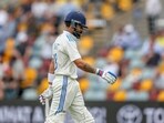 India's Virat Kohli walks off the field after losing his wicket during play on day three of the third cricket Test vs Australia.