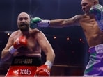 Tyson Fury (left) and Oleksandr Usyk during their bout on Saturday