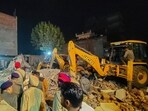 Mohali: Police personnel and others during a rescue operation after a multistorey building collapsed at Sohana village. Mohali: Police personnel and others during a rescue operation after a multistorey building collapsed at Sohana village.