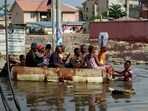 People use a makeshift boat to move after the Congo River rises to its highest level, causing flooding in Kinshasa, Democratic Republic of Congo. (Representative image)