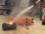 The fire is believed to have been caused by batteries in the bag. The fire is believed to have been caused by batteries in the bag.