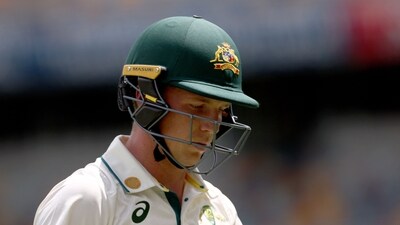Nathan McSweeney reacts as he walks off the ground after being dismissed at The Gabba in Brisbane (AFP) Nathan McSweeney reacts as he walks off the ground after being dismissed at The Gabba in Brisbane (AFP)