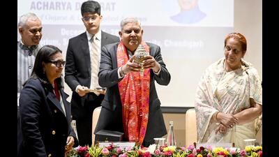 From left: Gujarat governor Acharya Devvrat, V-C Renu Vig, Vice-President Jagdeep Dhankhar and his wife Sudesh at the 5th Global Alumni Meet at Law Auditorium, Panjab University, in Chandigarh on Saturday. (RAVI KUMAR/HT) From left: Gujarat governor Acharya Devvrat, V-C Renu Vig, Vice-President Jagdeep Dhankhar and his wife Sudesh at the 5th Global Alumni Meet at Law Auditorium, Panjab University, in Chandigarh on Saturday. (RAVI KUMAR/HT)