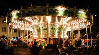 A carousel is pictured at the Christmas Market in Heidelberg, Germany on December 20, 2024. (AFP) A carousel is pictured at the Christmas Market in Heidelberg, Germany on December 20, 2024. (AFP)