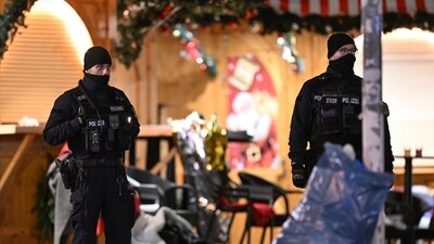 Germany car attack: Police stand at a Christmas market in Magdeburg, Germany, after a driver plowed into a group of people at the market late Friday.&nbsp; (AP)