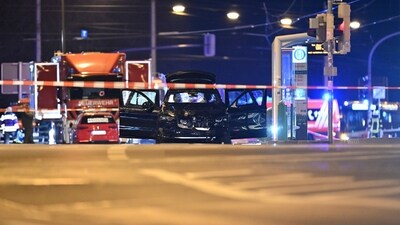 Germany car attack: A damaged car sits with its doors open after a driver plowed into a busy Christmas market in Magdeburg, Germany, early Saturday, Dec. 21, 2024.&nbsp; (AP)