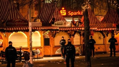 Germany car attack: Security guards stand in front of a cordoned-off Christmas Market after a car crashed into a crowd of people, in Magdeburg.&nbsp; 