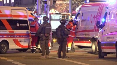 Police and ambulances stand next to the Christmas market, where a car crashed into a crowd on December 20, 2024 in Magdeburg, eastern Germany. (AFP) Police and ambulances stand next to the Christmas market, where a car crashed into a crowd on December 20, 2024 in Magdeburg, eastern Germany. (AFP)