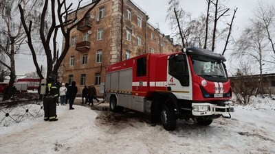 A Russian rescuer works in the courtyard of a residential building following a drone attack in Kazan. (AFP) A Russian rescuer works in the courtyard of a residential building following a drone attack in Kazan. (AFP)