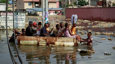 People use a makeshift boat to move after the Congo River rises to its highest level, causing flooding in Kinshasa, Democratic Republic of Congo. (Representative image) (REUTERS)