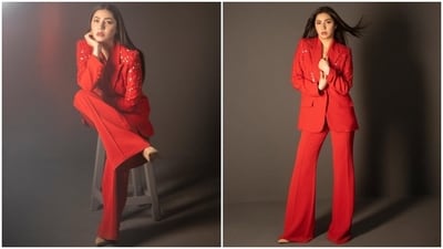 A perfect Christmas ensemble, Mahira looks stunning in this pantsuit fit. The shimmering red sequins on the blazer make it a perfect party look. She styled it with red lips, loose locks, nude pumps, minimal glam, and dainty ear studs.&nbsp; 