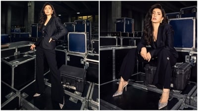 Serving a boss babe moment in this black satin suit, Mahira showed wearing pantsuits can be fun too., She wears a sleek form-fitted blazer, flared pants featuring delicate gold embroidery and side slits, and a tiny bralette-style top in these pictures.&nbsp; 