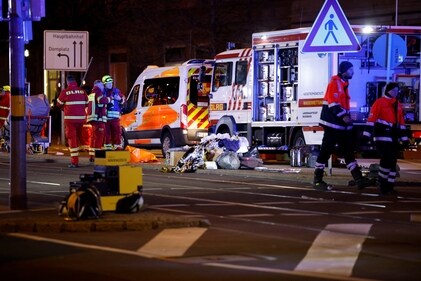 Emergency personnel work at a Christmas market after a car drove into a group of people, according to local media, in Magdeburg, Germany, December 21, 2024. (Reuters)