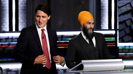 File Photo: Justin Trudeau (left) and NDP Leader Jagmeet Singh take part in the federal election English-language Leaders debate in Gatineau, Canada, on September 9, 2021. (REUTERS)