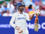 India's Ravindra Jadeja celebrates his half-century during the fourth day of the third test match against Australia, in Brisbane India's Ravindra Jadeja celebrates his half-century during the fourth day of the third test match against Australia, in Brisbane