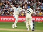 Indian bowler Jasprit Bumrah (L) reacts as a catch from Australian batsman Nathan McSweeney (R) is dropped on the first day of the second Test Indian bowler Jasprit Bumrah (L) reacts as a catch from Australian batsman Nathan McSweeney (R) is dropped on the first day of the second Test